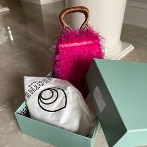 Brother Vellies pink Nile feather handbag